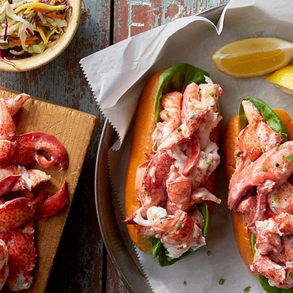 lobster meat on cutting board and maine lobster rolls
